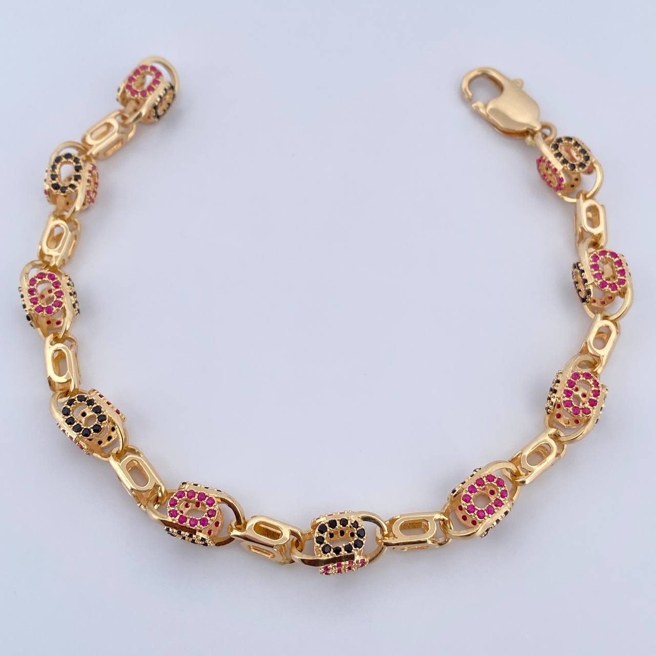 Pulso Rustico Ovalo  17.2gr / 20.3cm / 6.5mm Circones Fucsias Negros Oro Amarillo 18K $