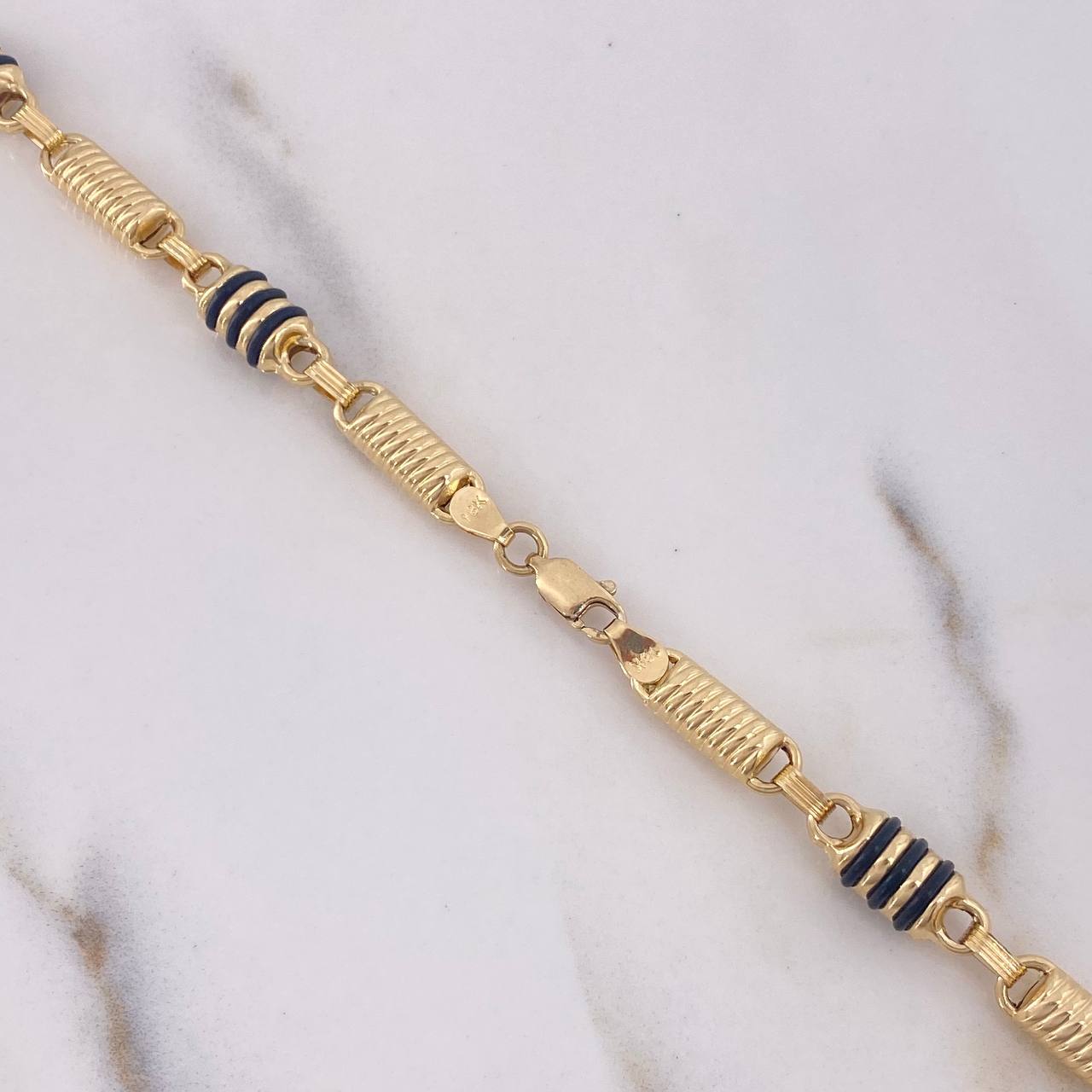 Cadena Rustica 24.2gr / 65cm / 6.17mm Cilindro Rayado Cauchos Negros Oro Amarillo 18K $