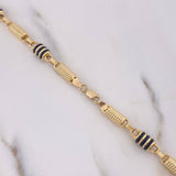 Cadena Rustica 24.2gr / 65cm / 6.17mm Cilindro Rayado Cauchos Negros Oro Amarillo 18K $