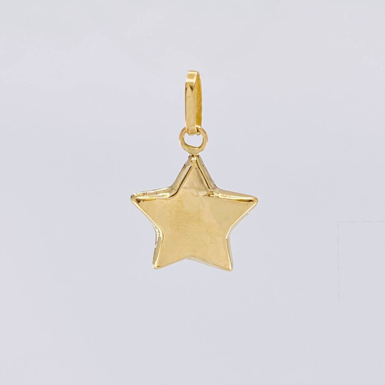 Dije Estrella 0.55g / 1.8cm Oro Amarillo 18K
