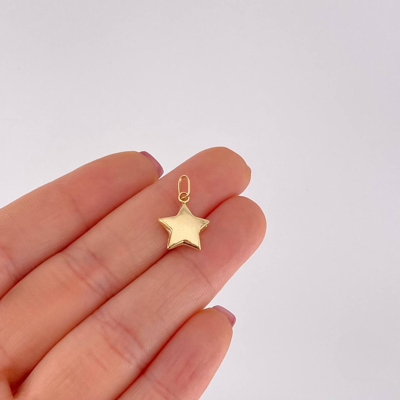 Dije Estrella 0.55g / 1.8cm Oro Amarillo 18K