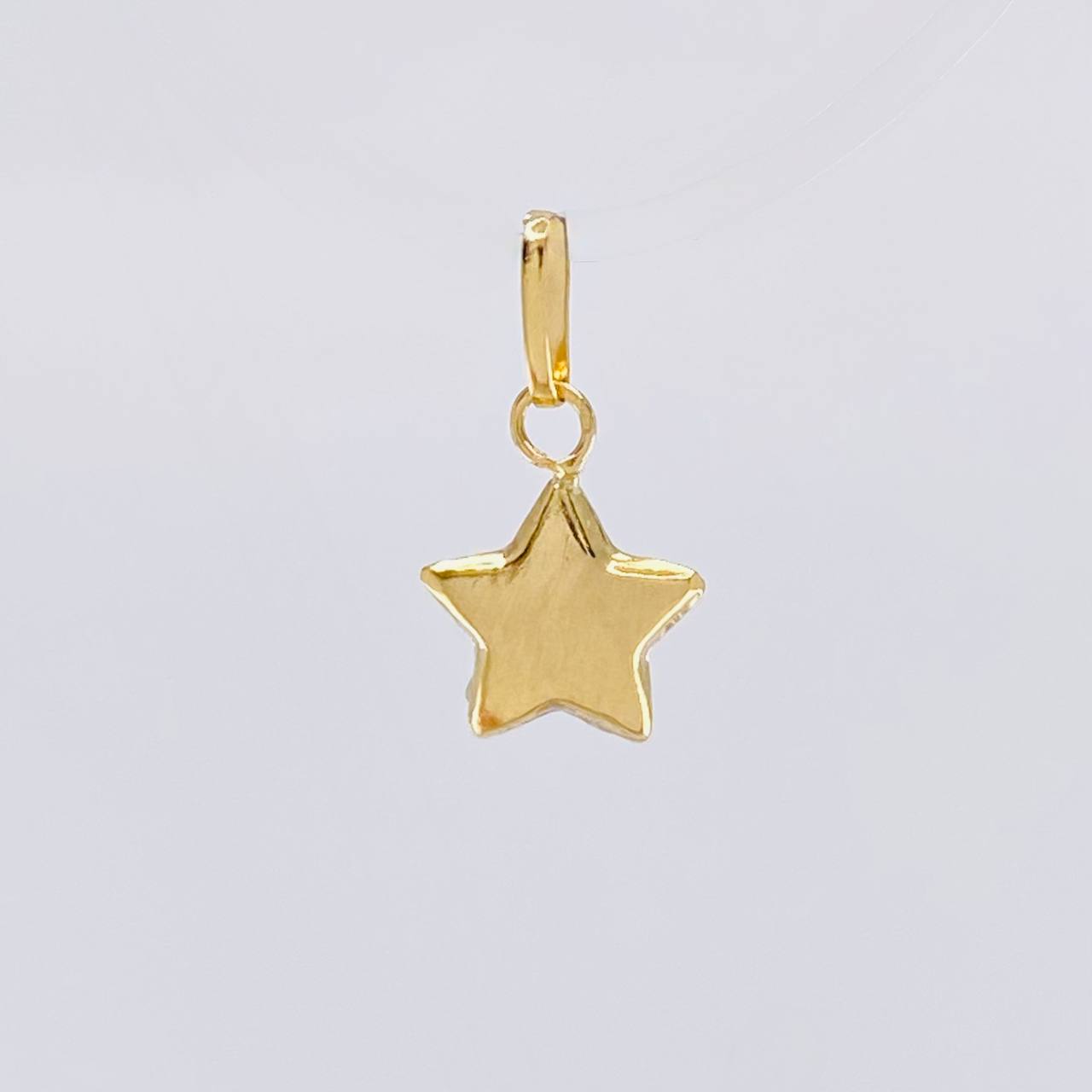 Dije Estrella 0.25g / 1.4cm Oro Amarillo 18K