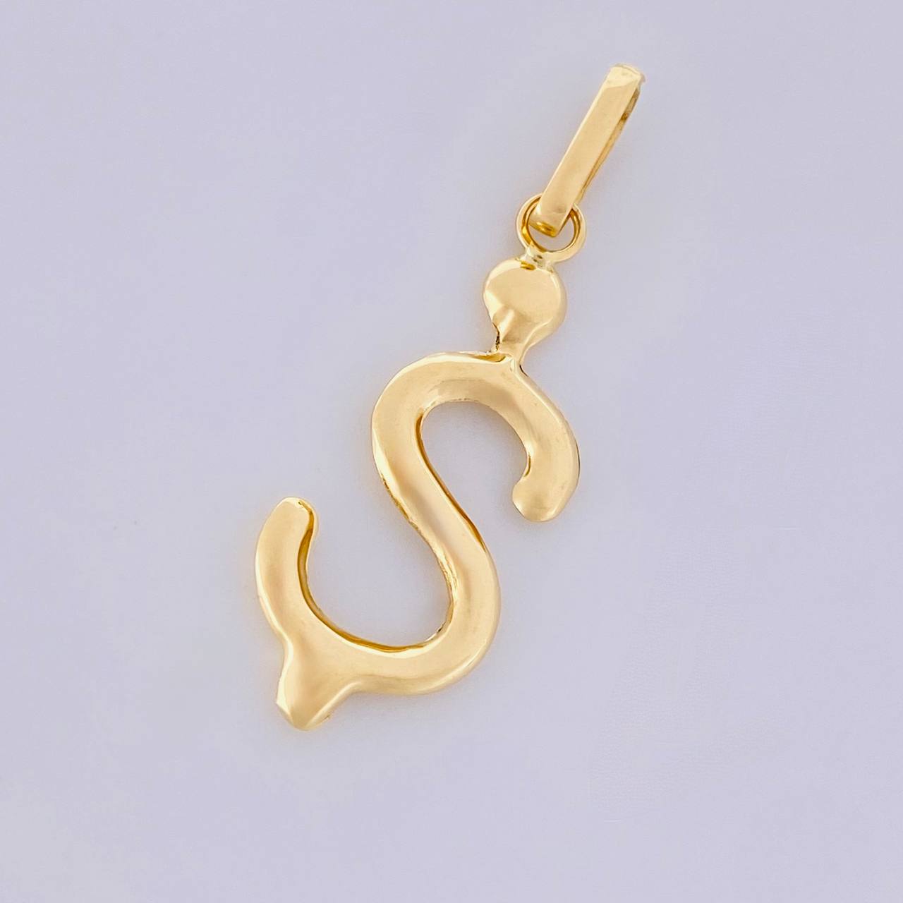 Dije Signo Pesos 0.75g / 3cm Oro Amarillo 18K