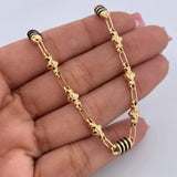 Pulso Rustico Barril Trebol 4.7gr / 20.8cm / 4.7mm Cauchos Negros Oro Amarillo 18K $