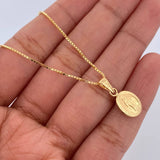 Set Cadena Veneciana 2.7gr/45.2cm / 0.6mm + Dije Virgen Milagrosa 0.55gr/1.7cm Troquelada Oro Amarillo 18K (Oferta) $