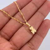 Set Cadena Singapur 1.35gr / 45.5cm / 0.7mm + Dije Oso 0.35gr / 1.3cm Troquelado Oro Amarillo 18K (Oferta) $