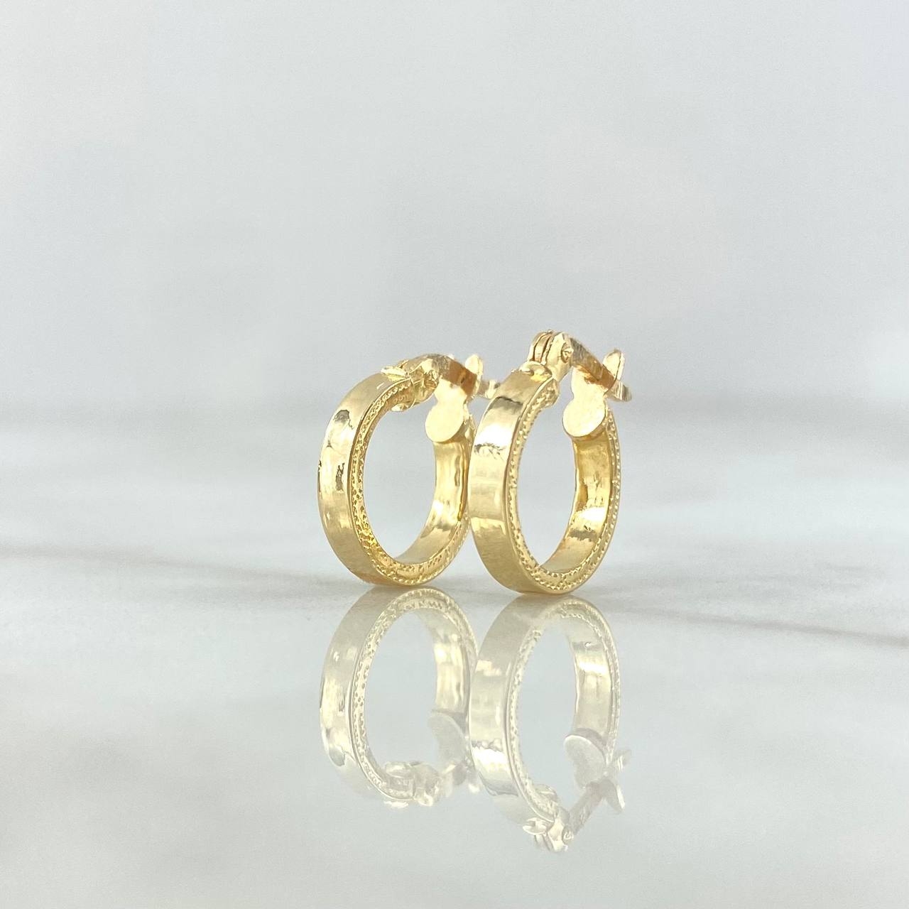 Candongas Tribal Punteado 0.85gr / 1.5cm / Oro Amarillo 18K