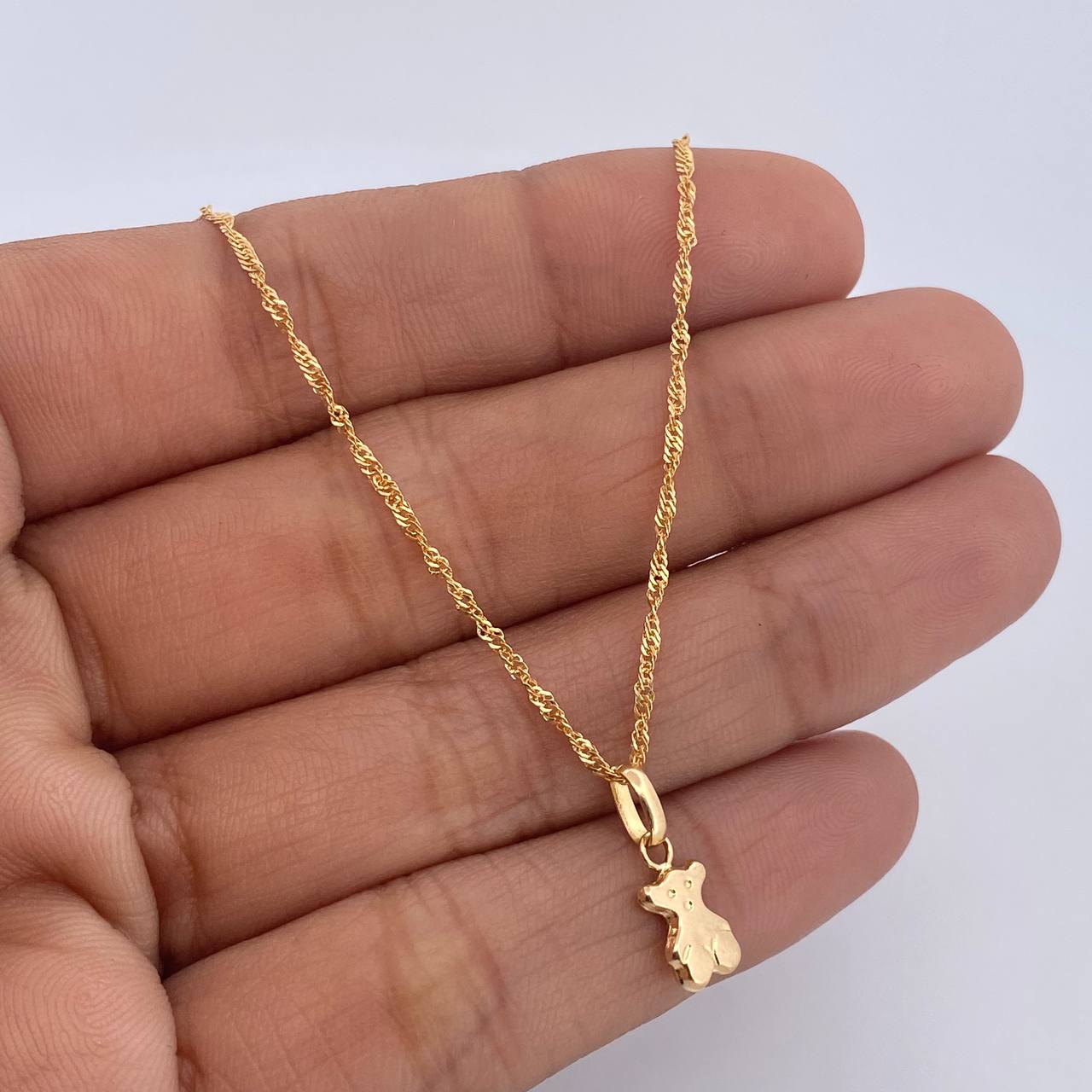 Set Cadena Singapur 1.4gr / 44.4cm / 1mm + Dije Oso TS 0.35 / 1.4cm Troquelado  Oro Amarillo 18K (Oferta) &