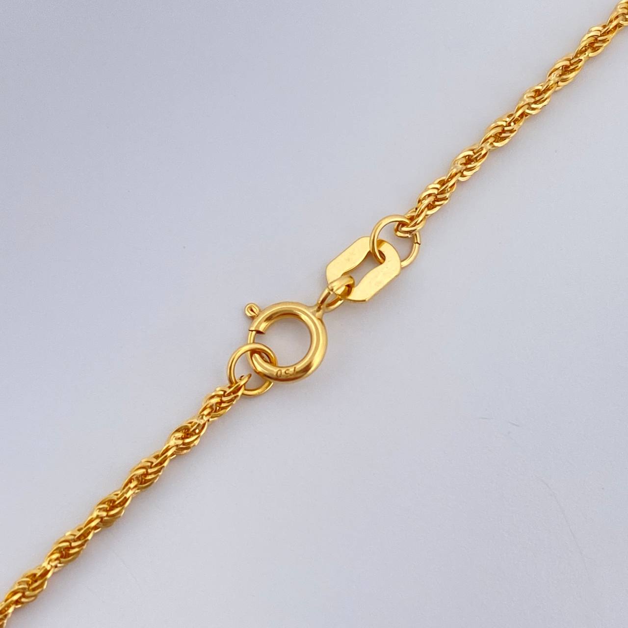 Set Cadena y Dije Lazo + San Benito 1.55gr / Oro Amarillo 18K (Oferta) $