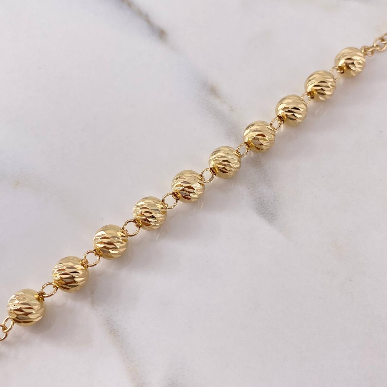 Rosario Virgen Milagrosa 37.75gr / 65cm / 7mm-8mm Bolas Diamantadas Circones Negros Blancos Oro Amarillo 18K $