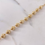 Rosario Virgen Milagrosa 37.75gr / 65cm / 7mm-8mm Bolas Diamantadas Circones Negros Blancos Oro Amarillo 18K $