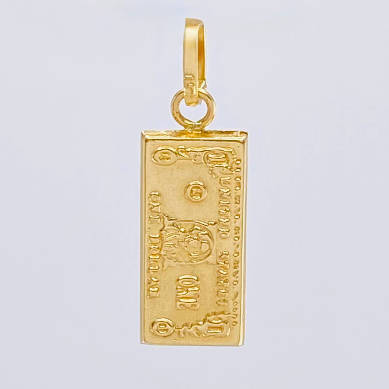 Dije One Dolar 0.6 g / 2.1 cm Oro Amarillo 18K
