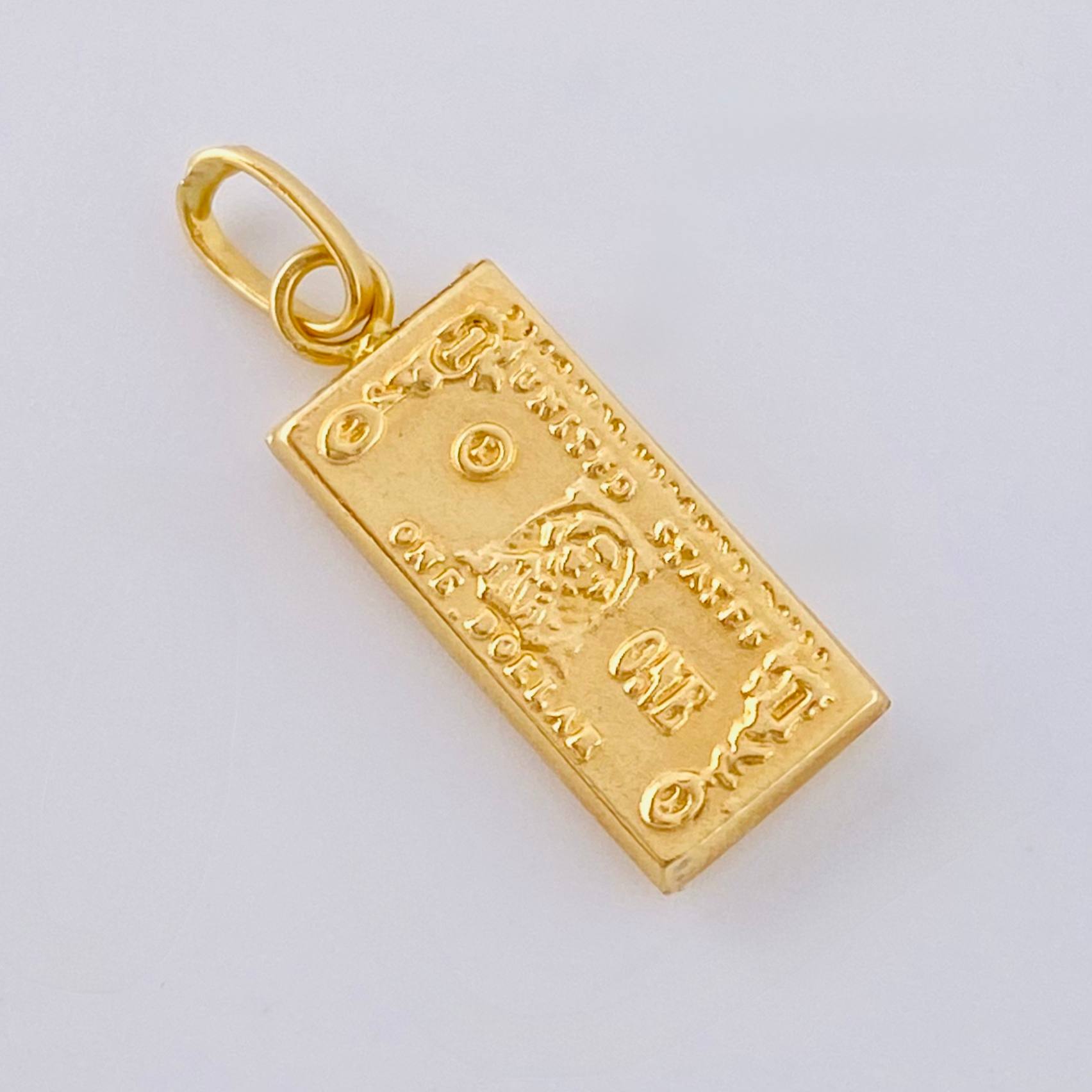 Dije One Dolar 0.6 g / 2.1 cm Oro Amarillo 18K