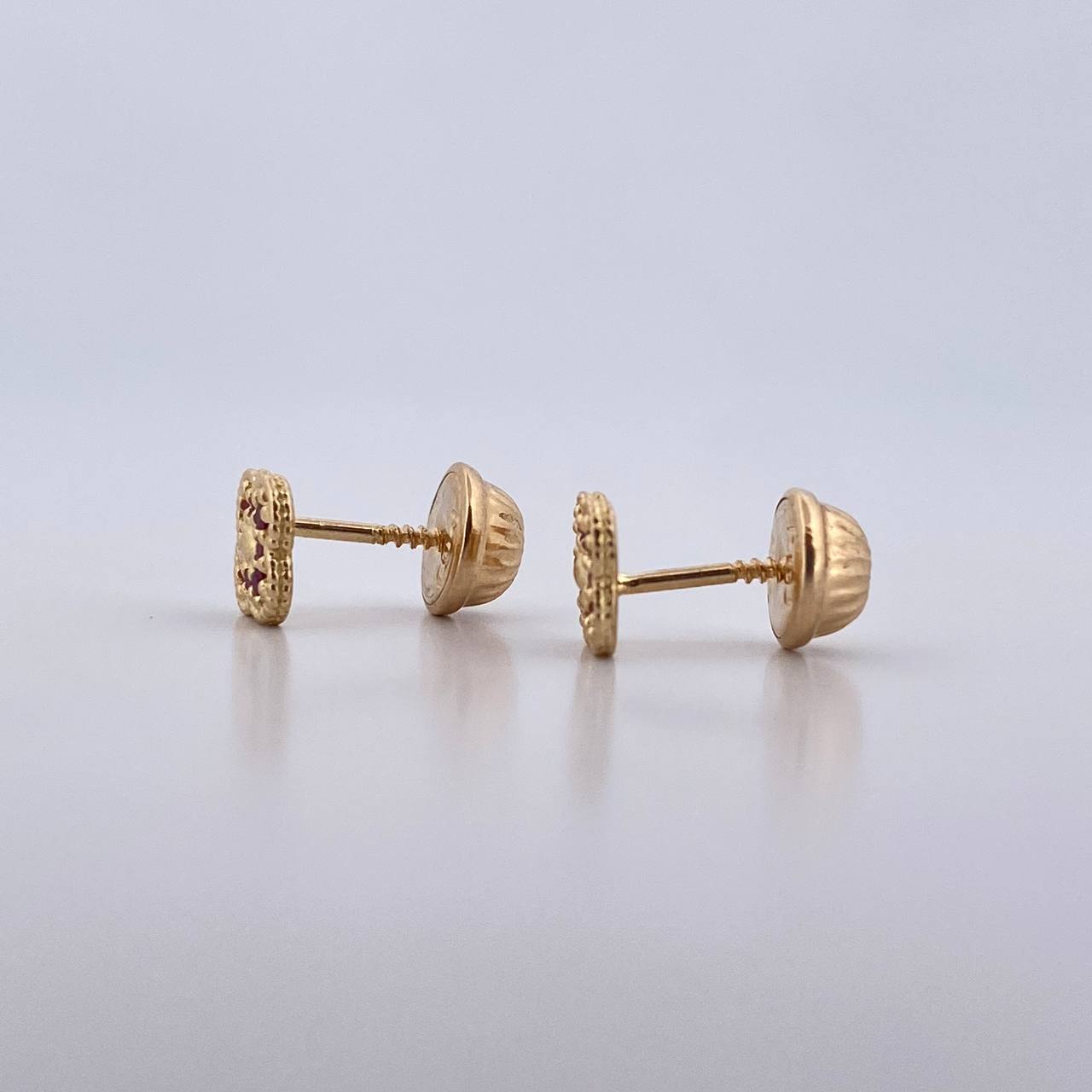 Topos Flor 0.85gr / Fucsias Oro Amarillo 18K &