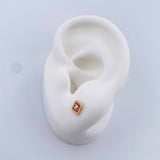 Topos Flor 0.85gr / Fucsias Oro Amarillo 18K &