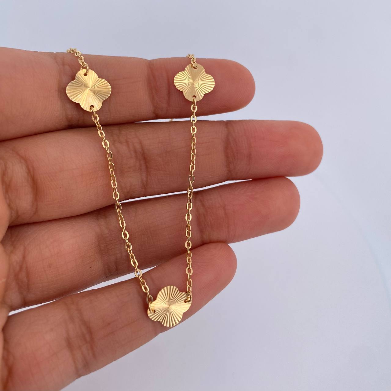Tobillera Aro Seguido Treboles 1.95gr / 25cm / 1.1mm Diamantada Oro Amarillo 18K &