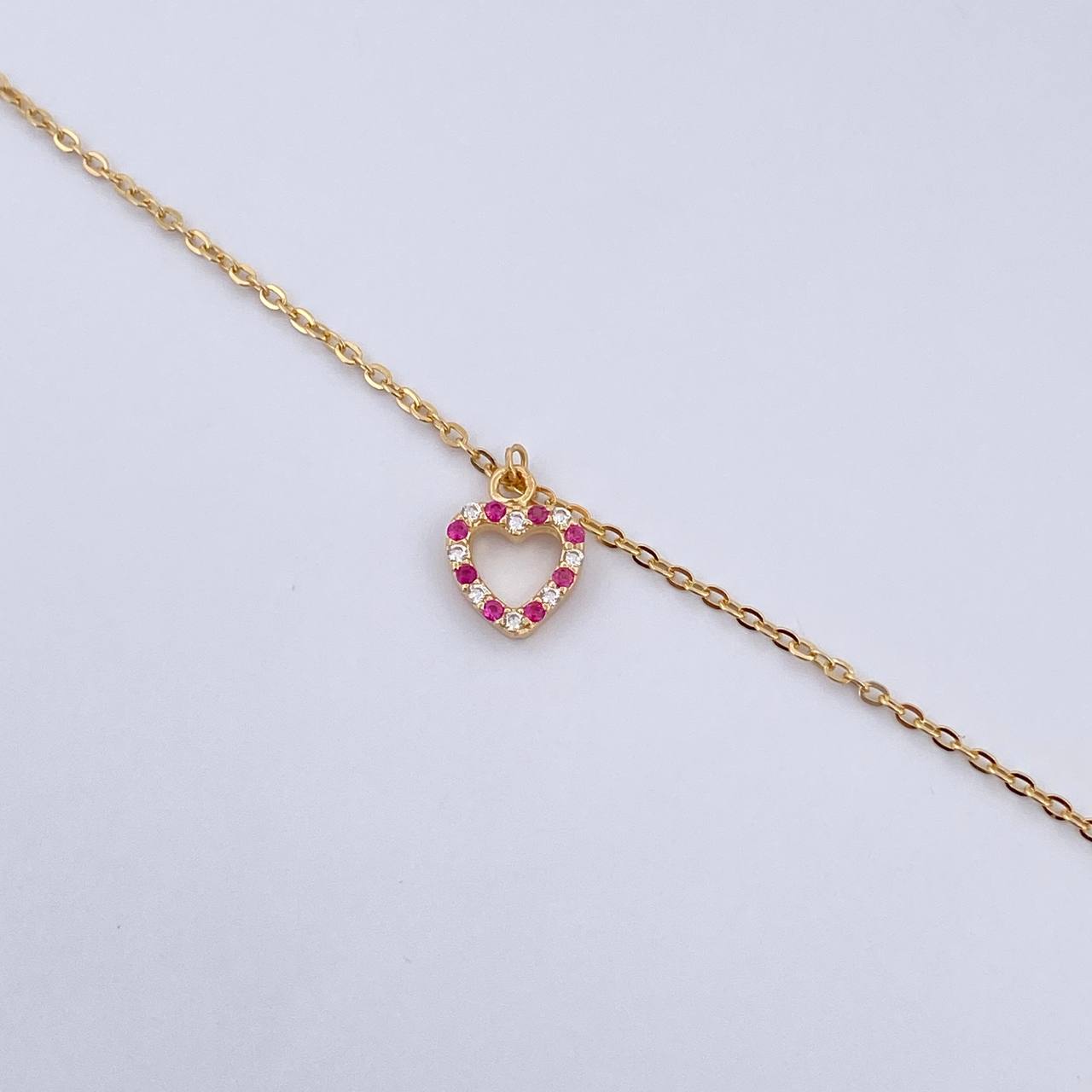 Tobillera Aro Seguido Silueta Corazon 2.1gr / 25.4cm / 4mm Bolas Diamantadas Circones Fucsias Blancos Oro Amarillo 18K &