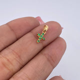 Dije Cruz 0.55gr / 1.4cm / Esmeraldas 06 Pts Oro Amarillo 18K (Joya) &
