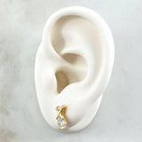 Topos Delta Cruzada 2.3gr / 1.1cm / Broche Mariposa Circones Blancos Oro Amarillo 18K ©