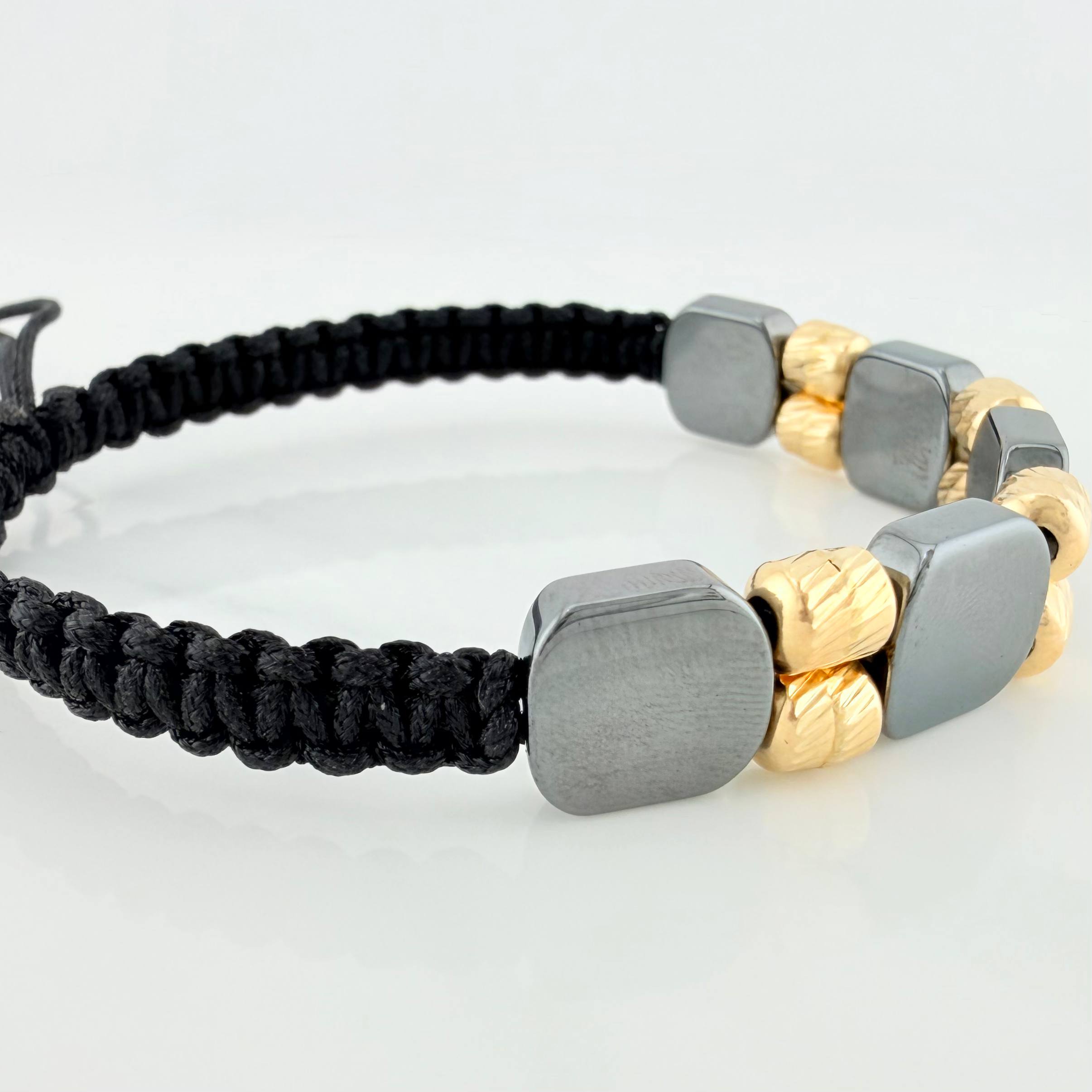 Pulsera Tejida Negra Piedra Hematita Oro Amarillo 18K