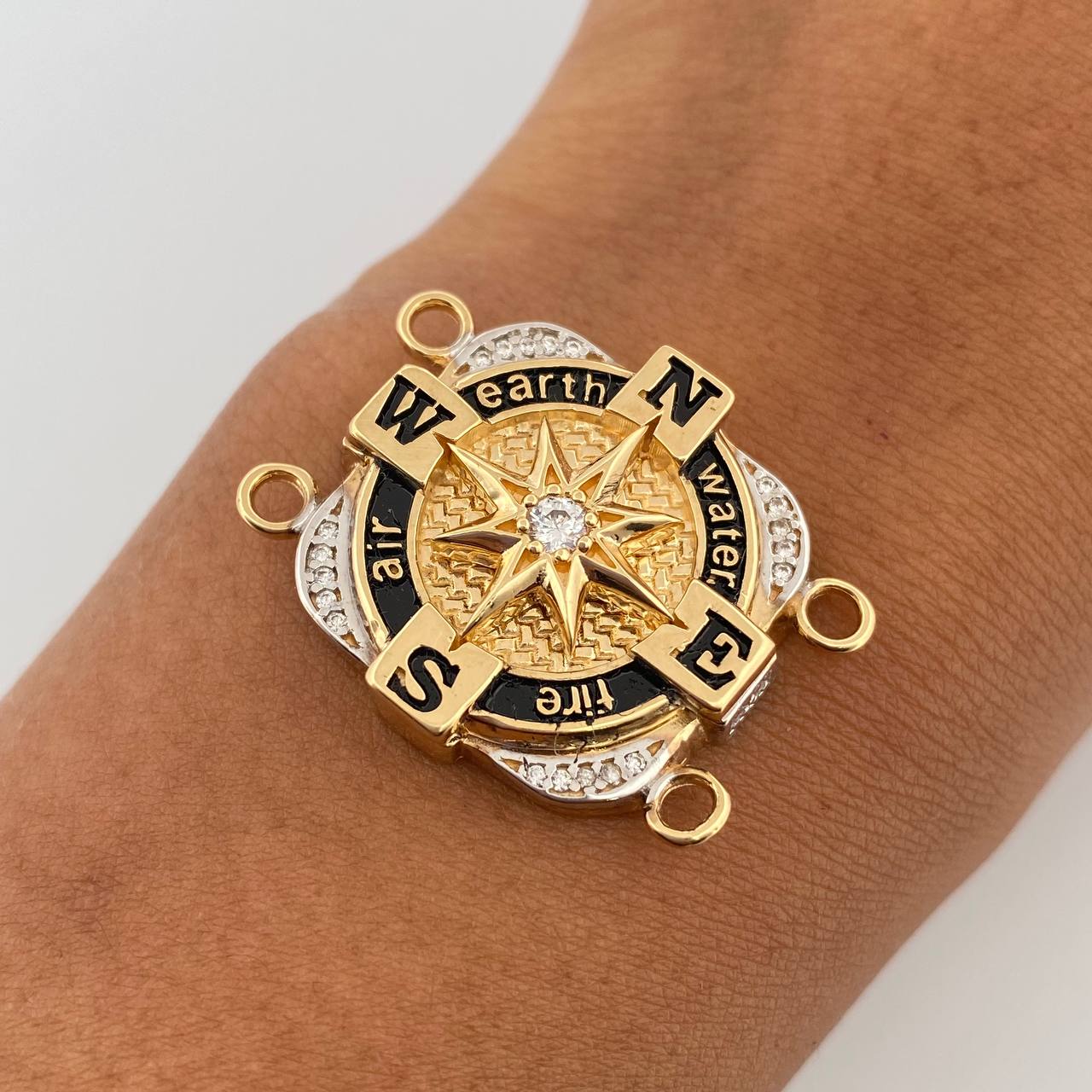 Herraje Estrella Cardinal 12.15gr / 3cm / Oro 18K $