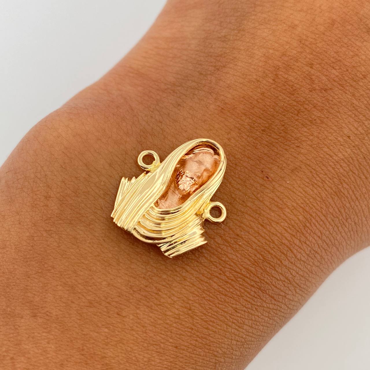 Herraje Rostro Cristo 2.9gr / 1.8cm / Oro 18K $