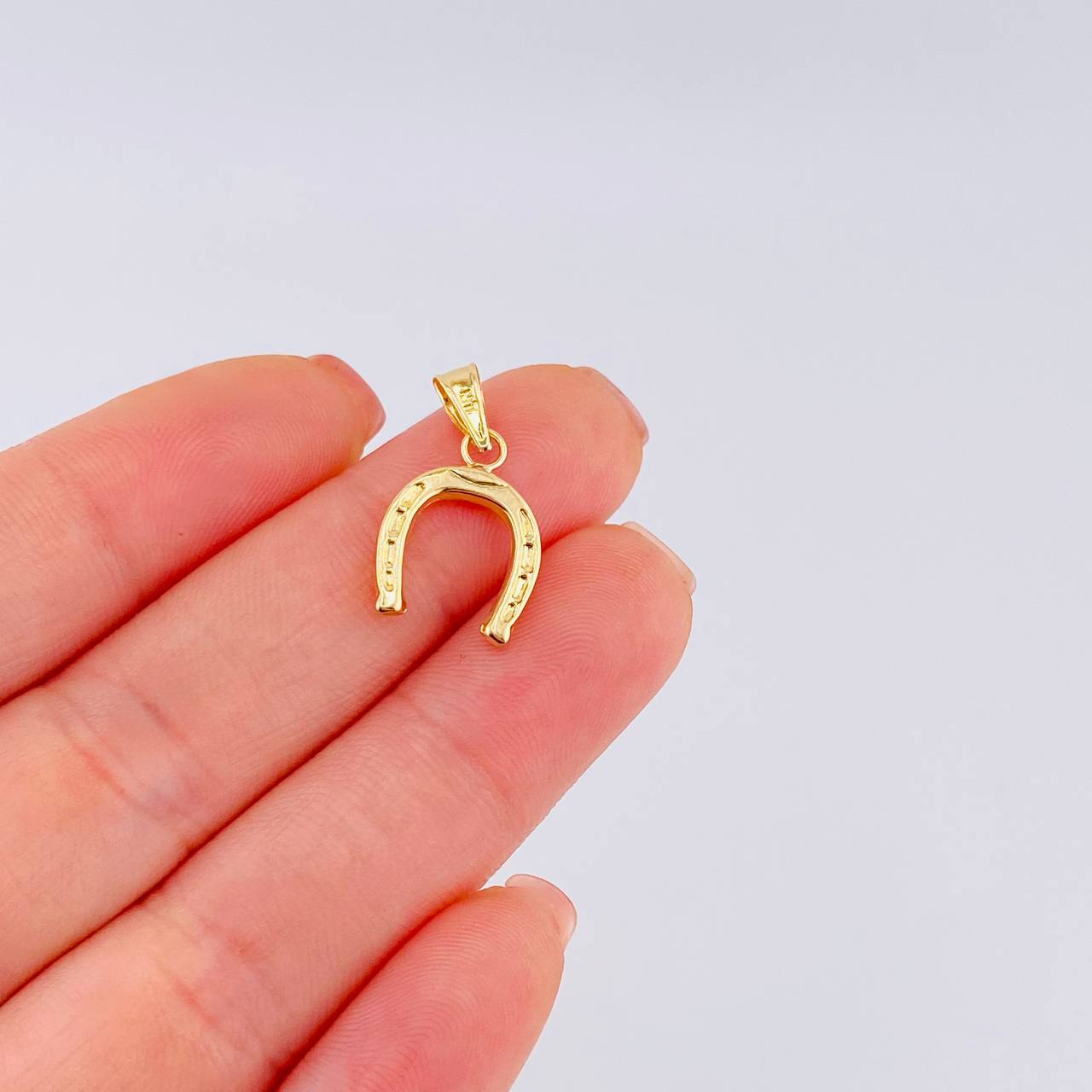 Dije Herradura 0.7 g / 2.1 cm Oro Amarillo 18K