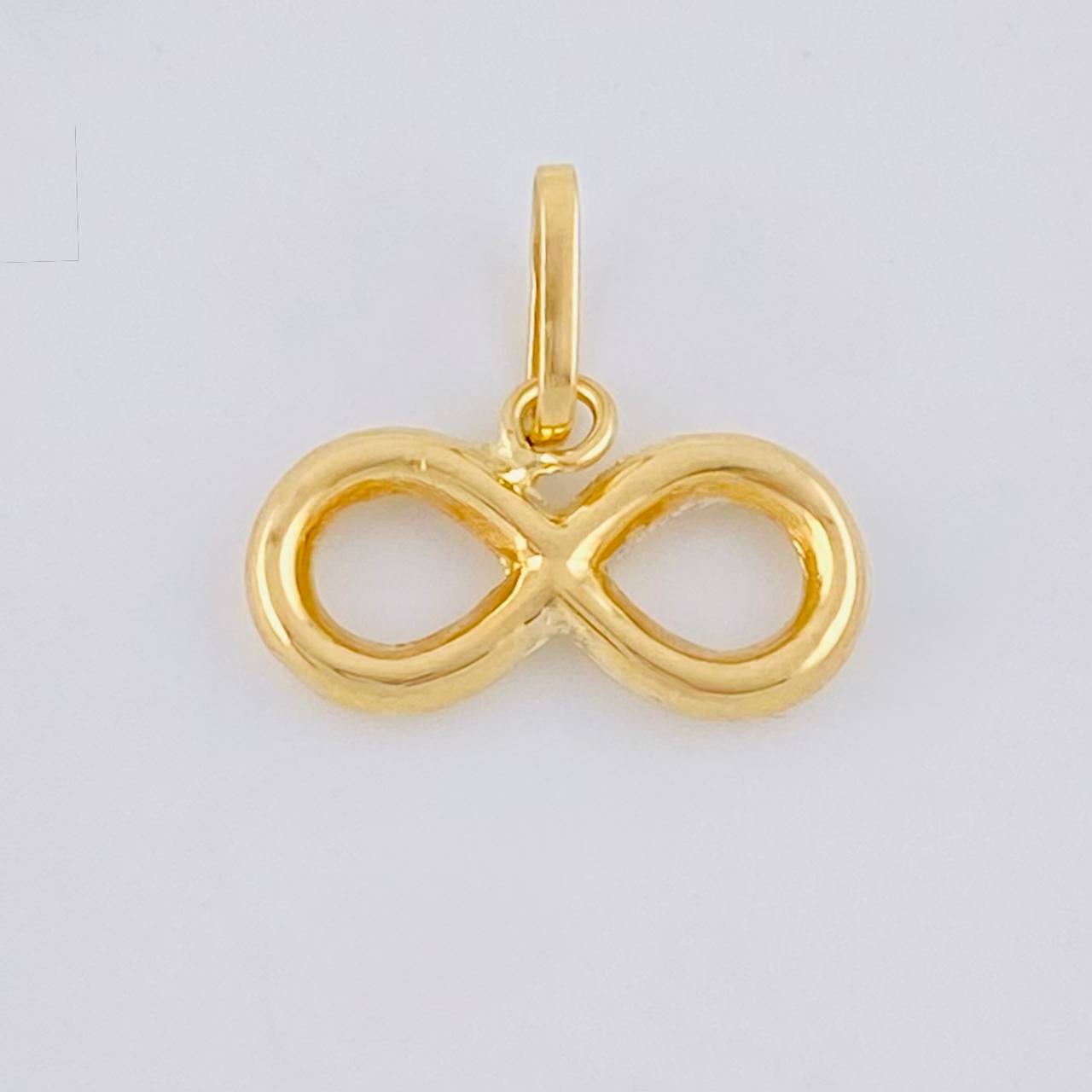 Dije Infinito 0.5 g / 1.2 cm Oro Amarillo 18K