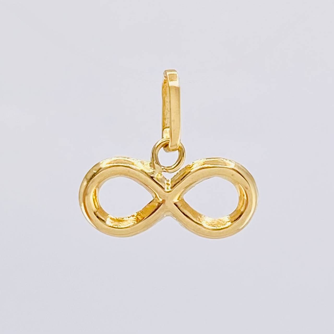 Dije Infinito 0.4 g / 1.2 cm Oro Amarillo 18K