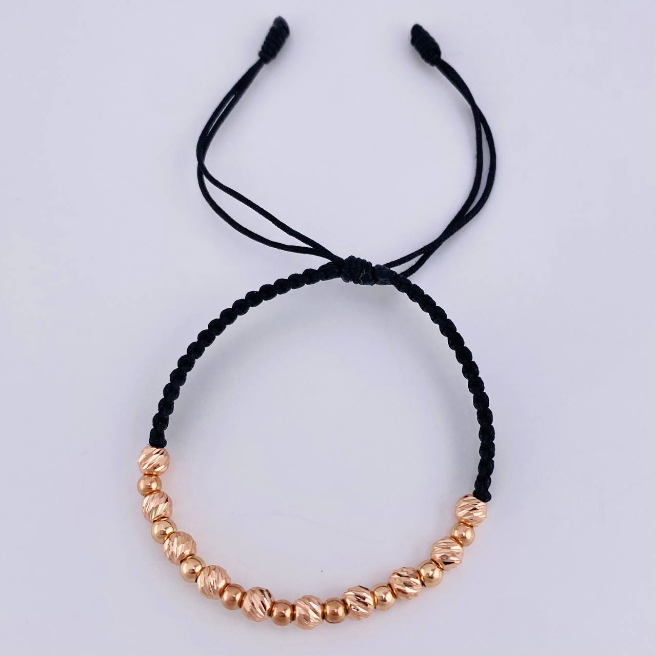 Pulsera Tejida Negra Bolas Lisas 10 Und- 4Mm / Diamantada 9 Und- 3Mm Oro Rosa 18K