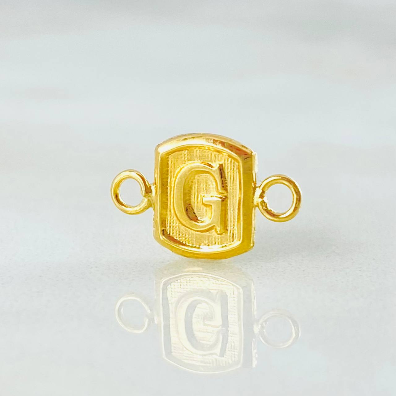 Herraje Letra G 0.35gr / 1.2cm / Oro Amarillo 18K