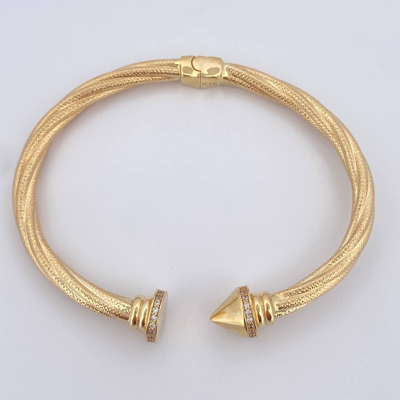 Pulso Entrelazado 12.3gr / 20.4cm / +4 Oro 18K $
