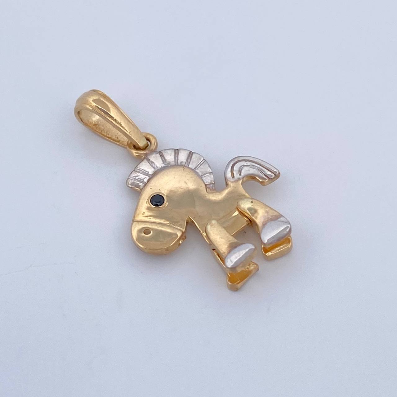 Dije Caballo Articulado 1.85gr / 2.4cm / Oro 18K $