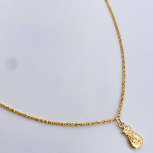 Set Cadena Lazo 1.15gr / 60cm / 1.2mm + Dije Bolsa Dinero 0.35gr / 1.7cm Oro Amarillo 18K (Oferta) &