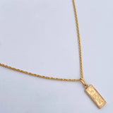 Set Cadena Lazo 1.15gr / 59.8 / 1.1mm + Dije Dolar 0.65gr / 2.1cm Troquelado Oro Amarillo 18K (Oferta) &