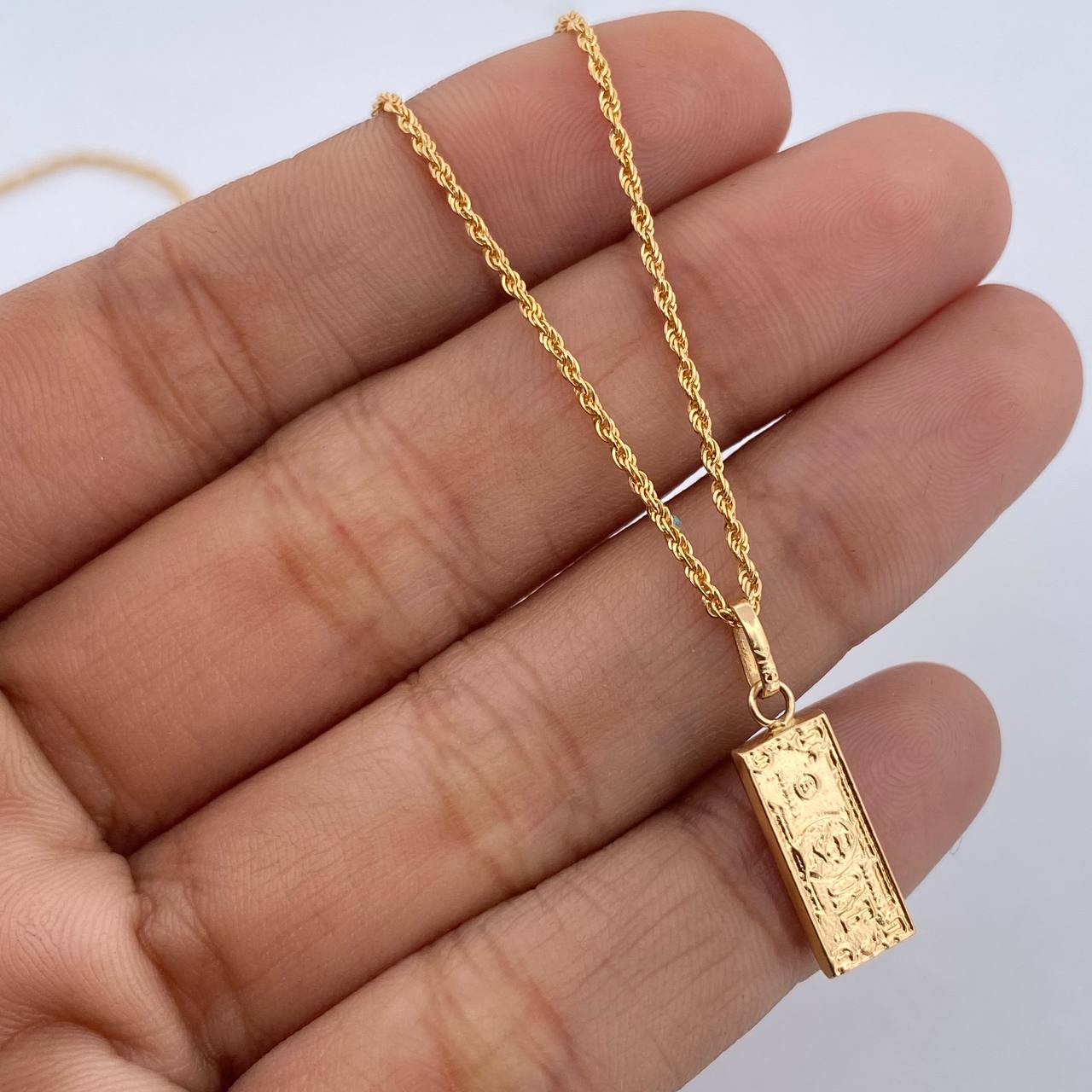 Set Cadena Lazo 1.15gr / 59.8 / 1.1mm + Dije Dolar 0.65gr / 2.1cm Troquelado Oro Amarillo 18K (Oferta) &