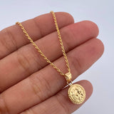 Set Cadena Lazo 1.15gr / 60cm / 1.2mm + Dije Sagrada Familia 0.6gr / 1.7cm Oro Amarillo 18K (Oferta) &