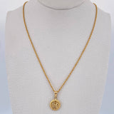 Set Cadena Lazo 1.15gr / 60cm / 1.2mm + Dije Sagrada Familia 0.6gr / 1.7cm Oro Amarillo 18K (Oferta) &