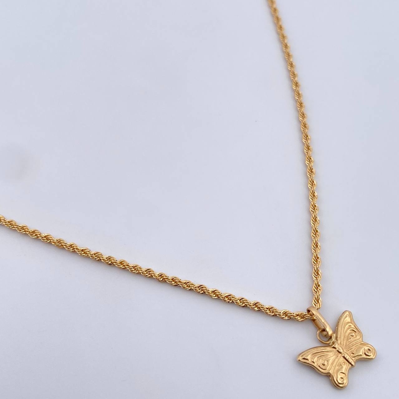 Set Cadena Lazo 1.85gr /50cm / 1.6mm + Dije Mariposa 0.6gr / 1.4cm Troquelado Oro Amarillo 18K (Oferta) &