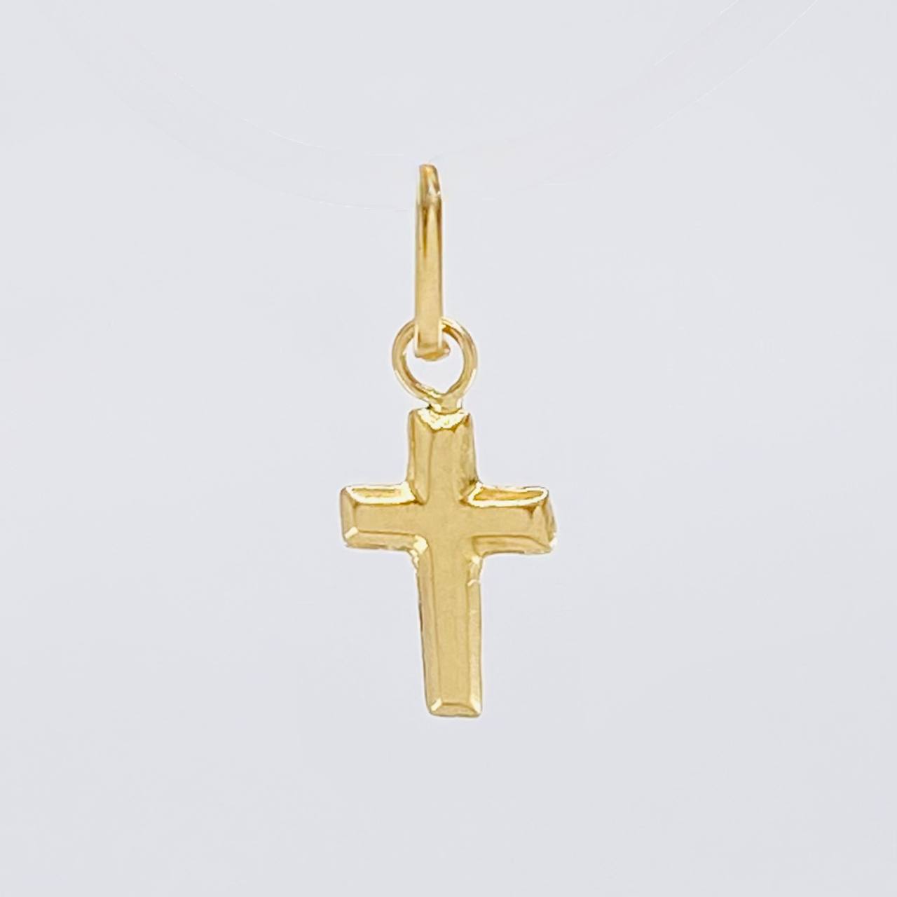 Dije Cruz Lisa 0.15g / 1.5cm Oro Amarillo 18K