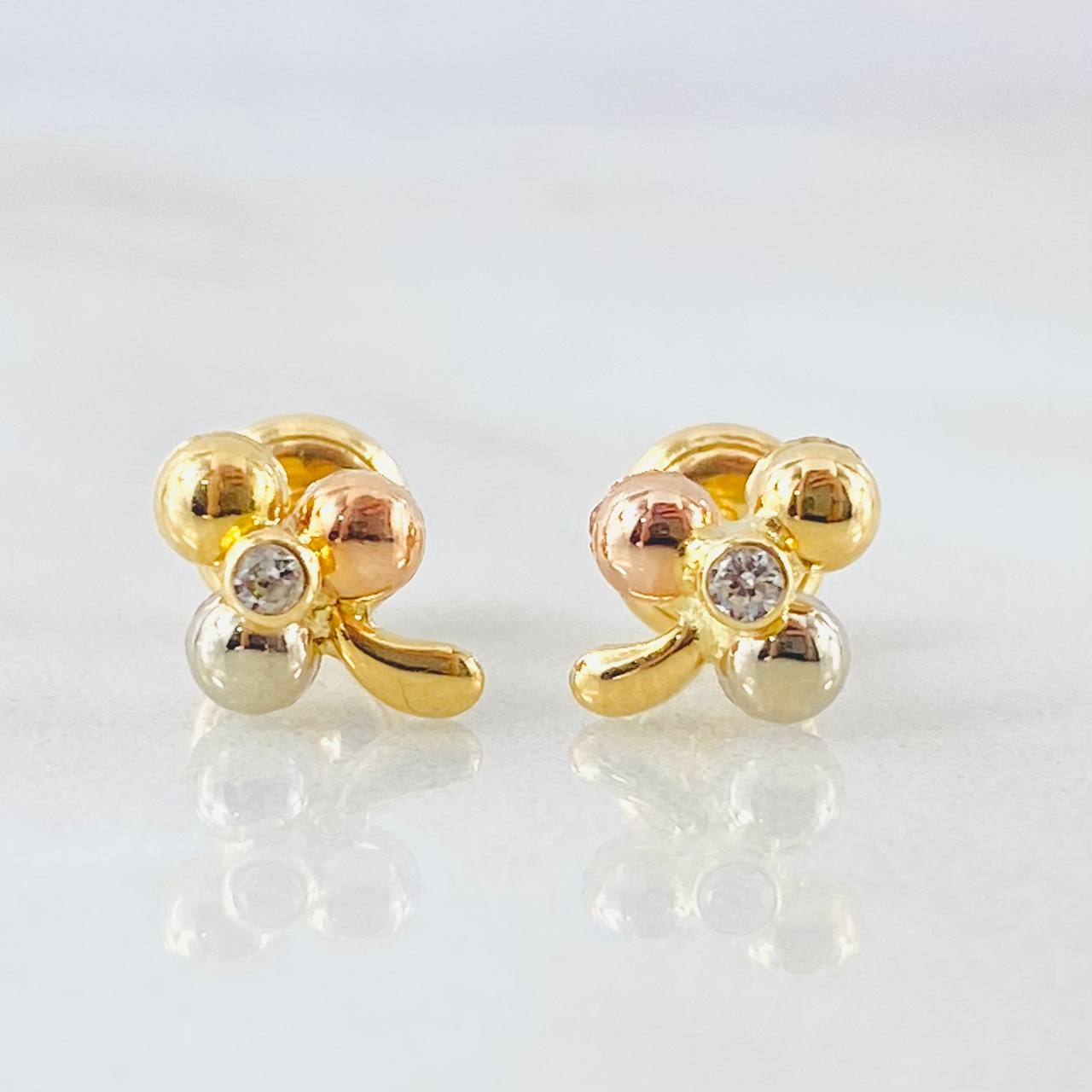 Topos Flor Trio 0.8gr / Tres Oros 18K *