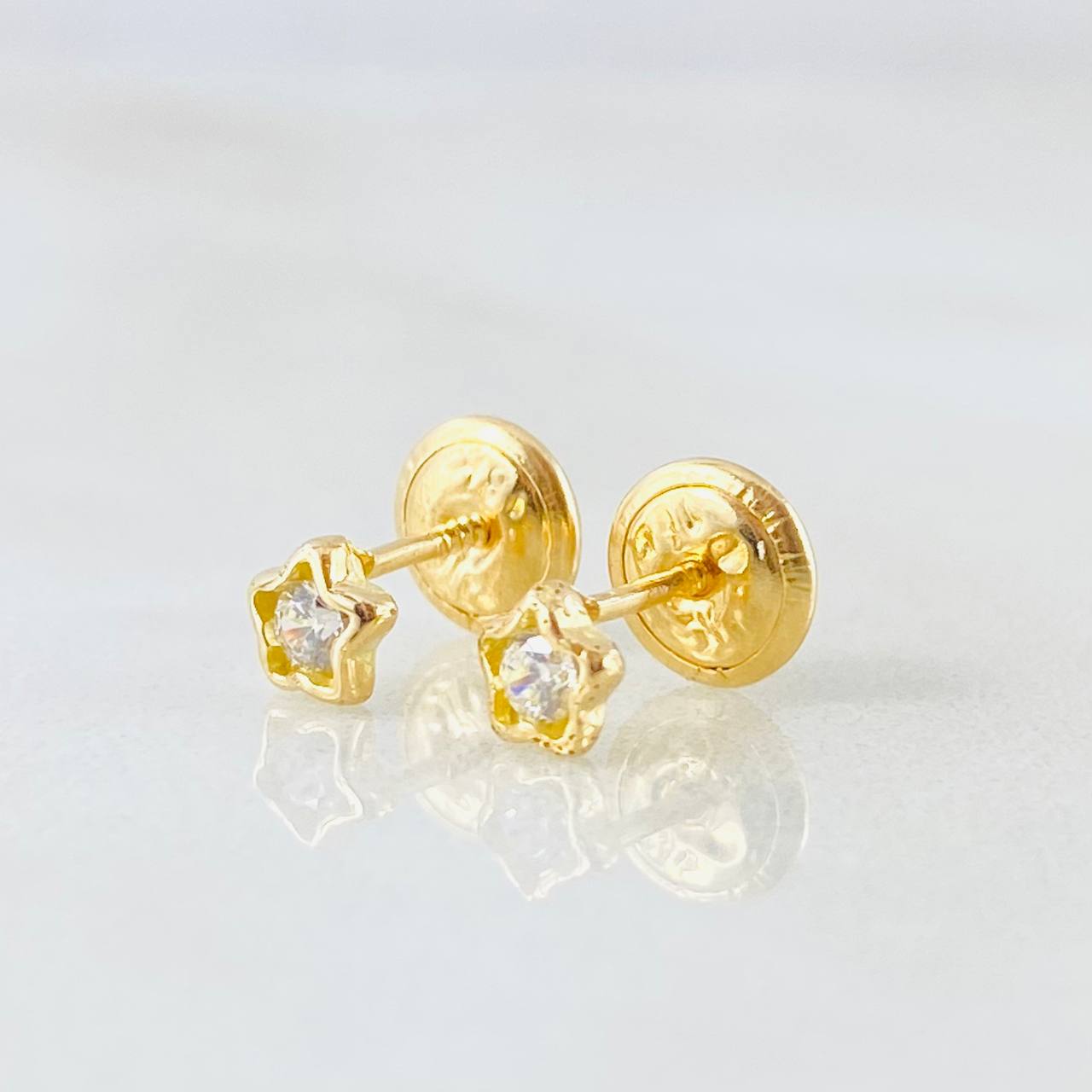 Topos Estrella 0.6gr / Oro Amarillo 18K ©
