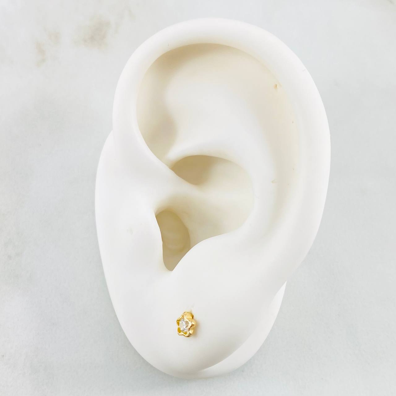 Topos Estrella 0.6gr / Oro Amarillo 18K ©