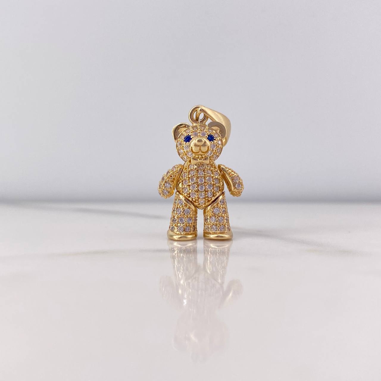 Dije Oso Articulado 4.75gr / 2.9cm / Circones Blancos Azules Oro Amarillo 18K $