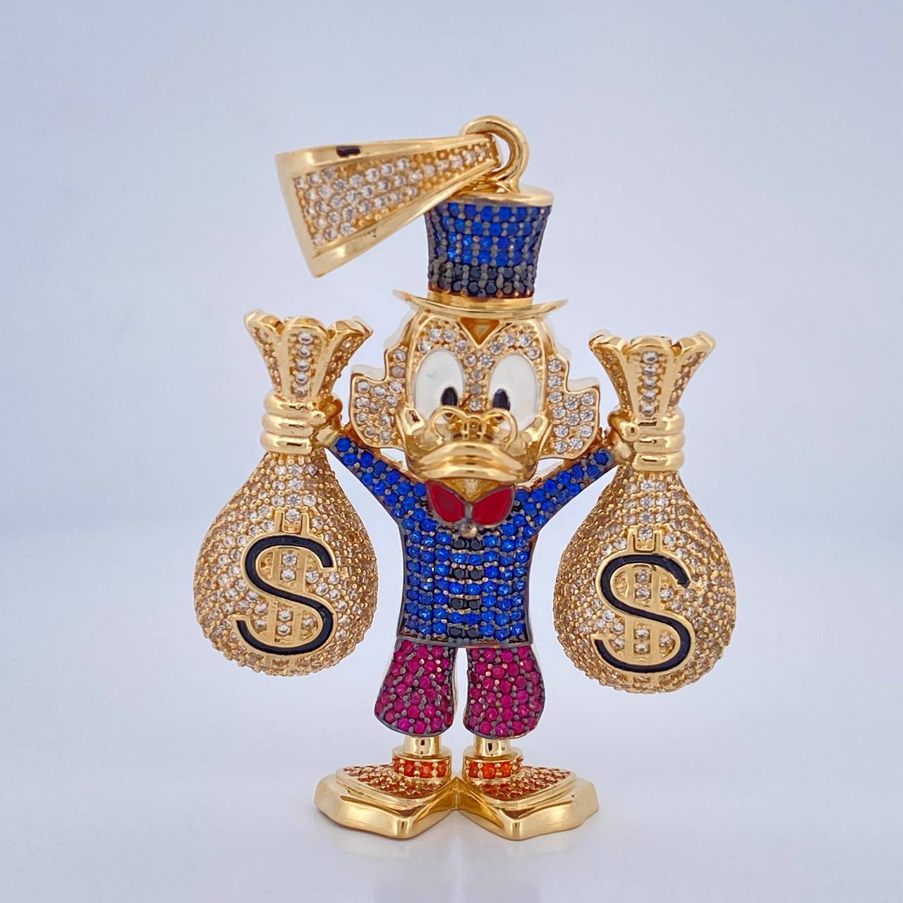 Dije Pato Bolsas Dinero 36.65gr / 6.6cm / Oro 18K $