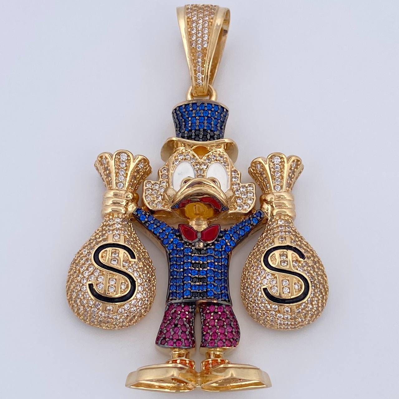 Dije Pato Bolsas Dinero 36.65gr / 6.6cm / Oro 18K $
