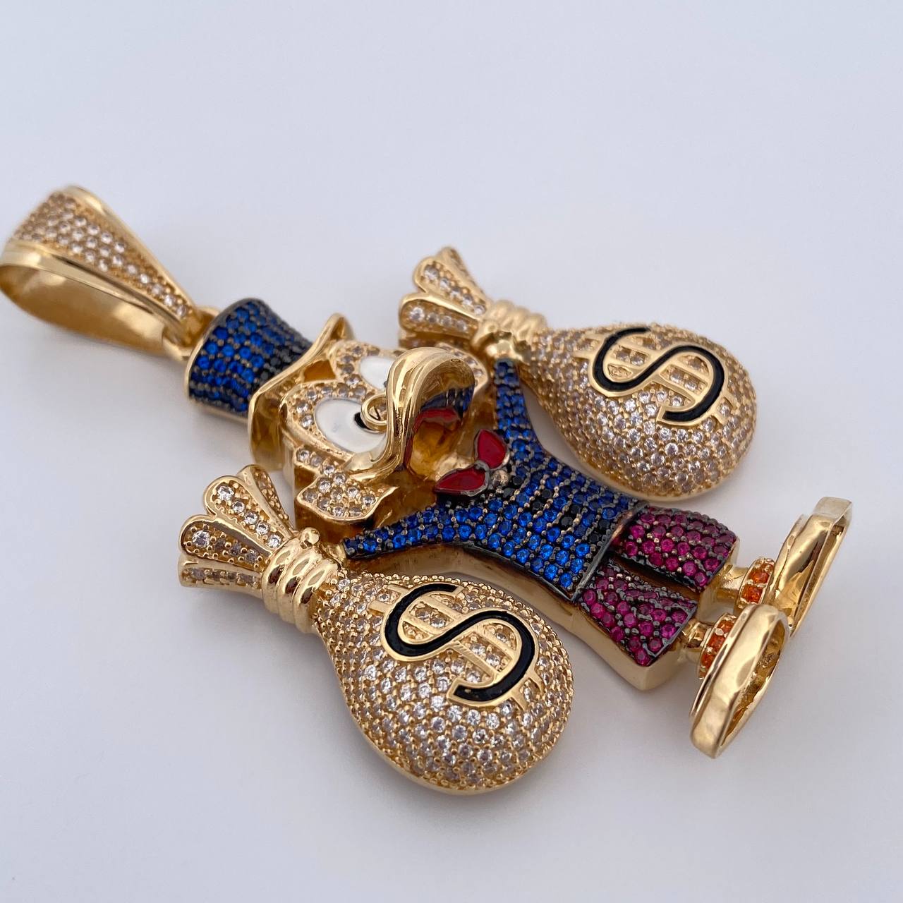Dije Pato Bolsas Dinero 36.65gr / 6.6cm / Oro 18K $