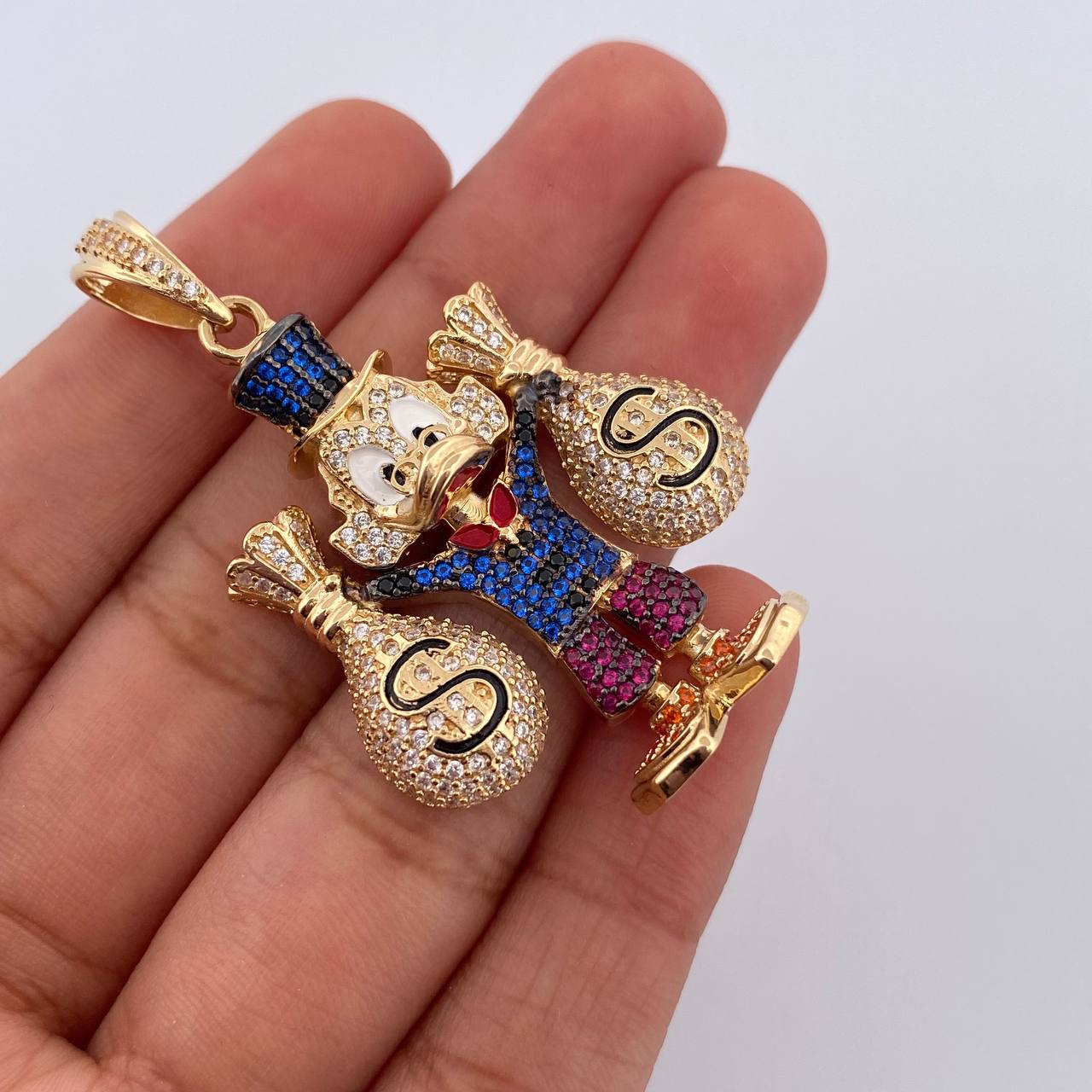Dije Pato Bolsas Dinero 15.3gr / 4.7cm / Oro 18K $