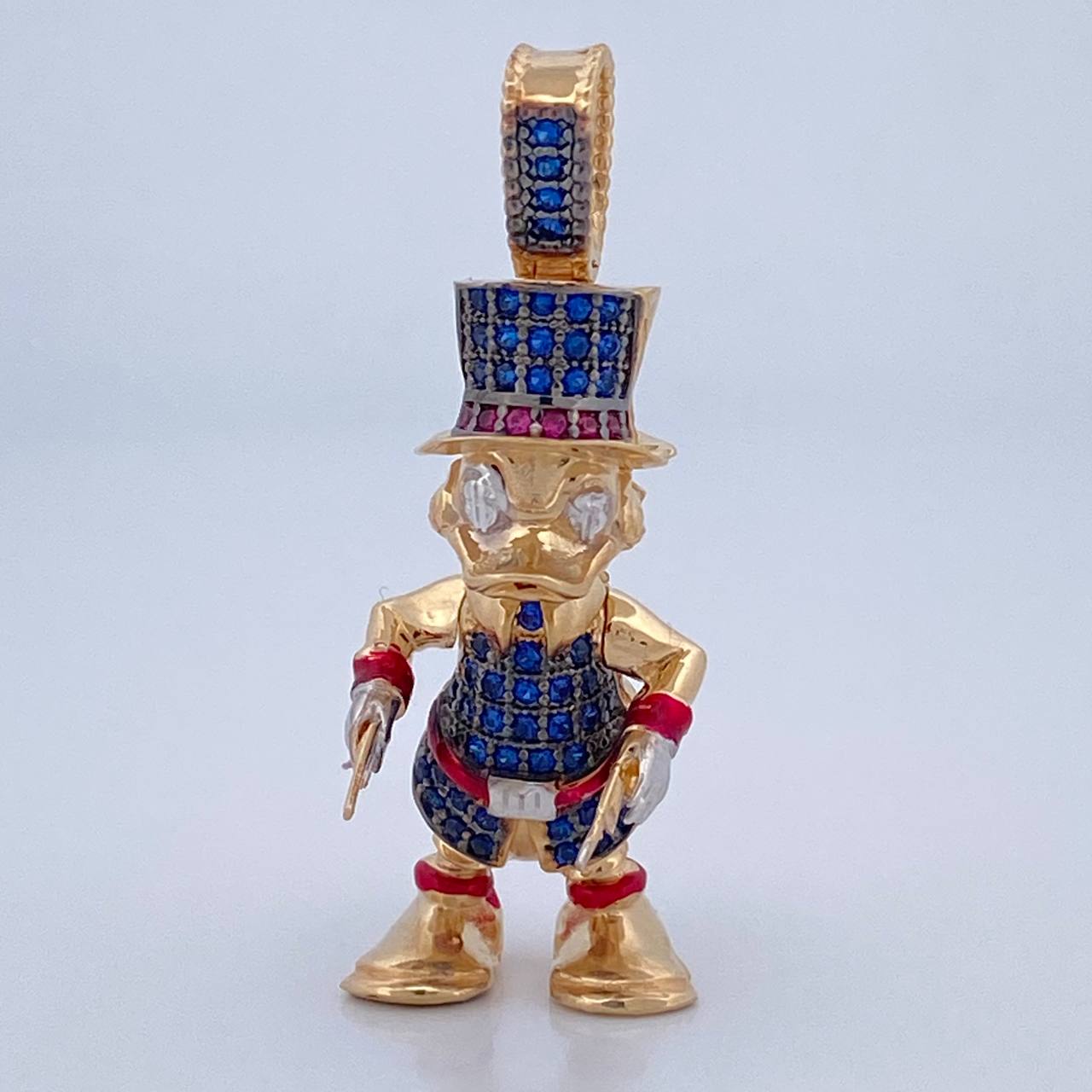 Dije Pato Furioso Pistolas 7.8gr / 3.6cm / Oro 18K $