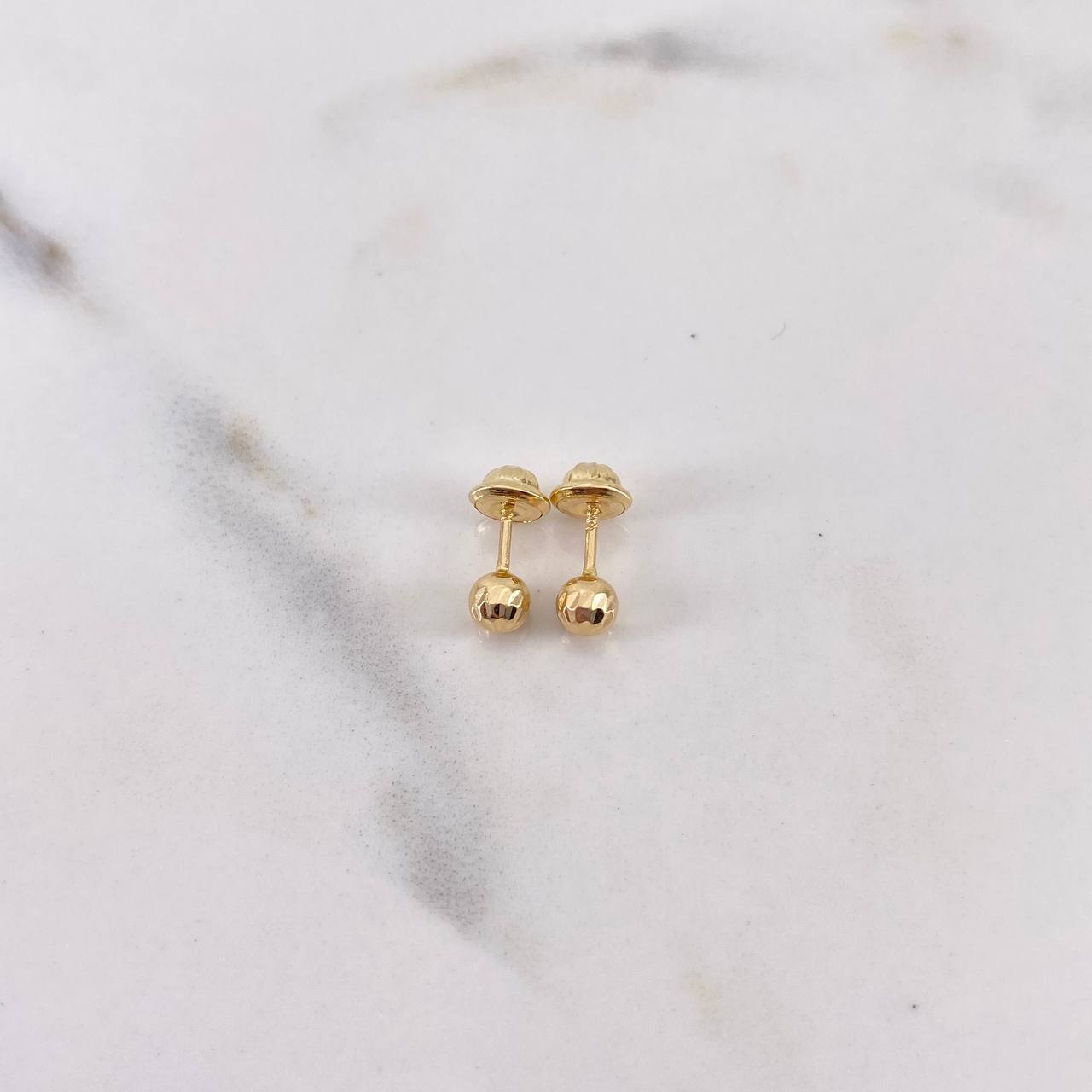 Topos Bola 0.65gr / 4mm Diamantadas Oro Amarillo 18K $